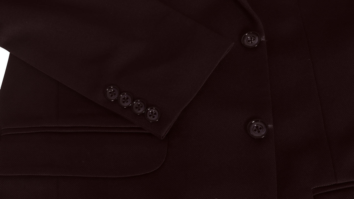 Close-up of a wine colour coat sleeve with buttons