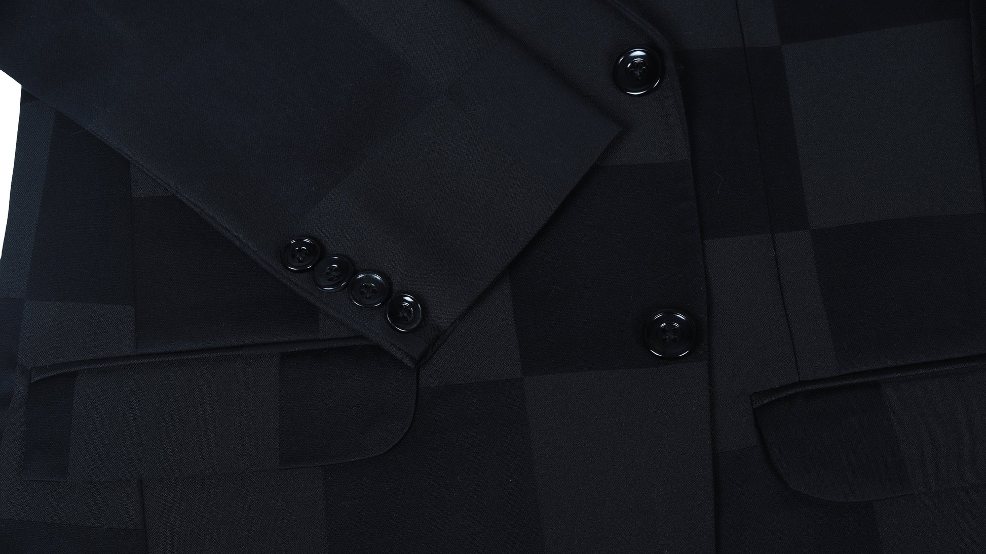 Close-up of a black checkered coat with buttons