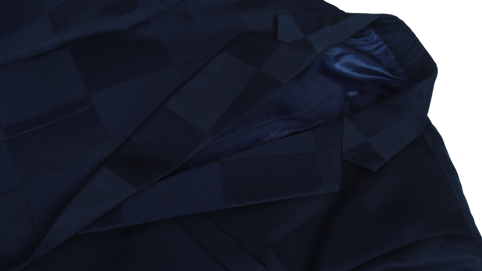 Dark blue check coat fabric on a white background