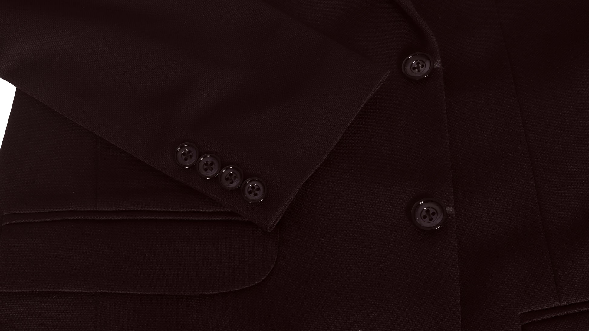 Close-up of a wine colour coat sleeve with buttons